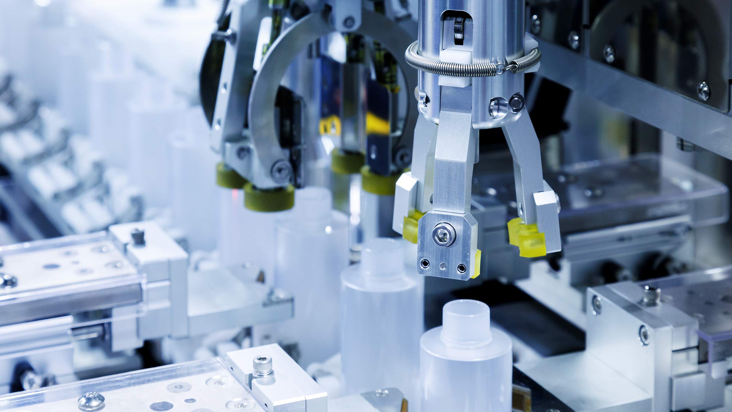 A closeup of automated consumer product assembly