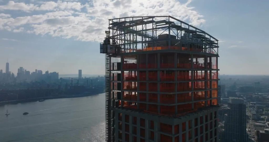 Construction - Zoom in on skyscraper under construction